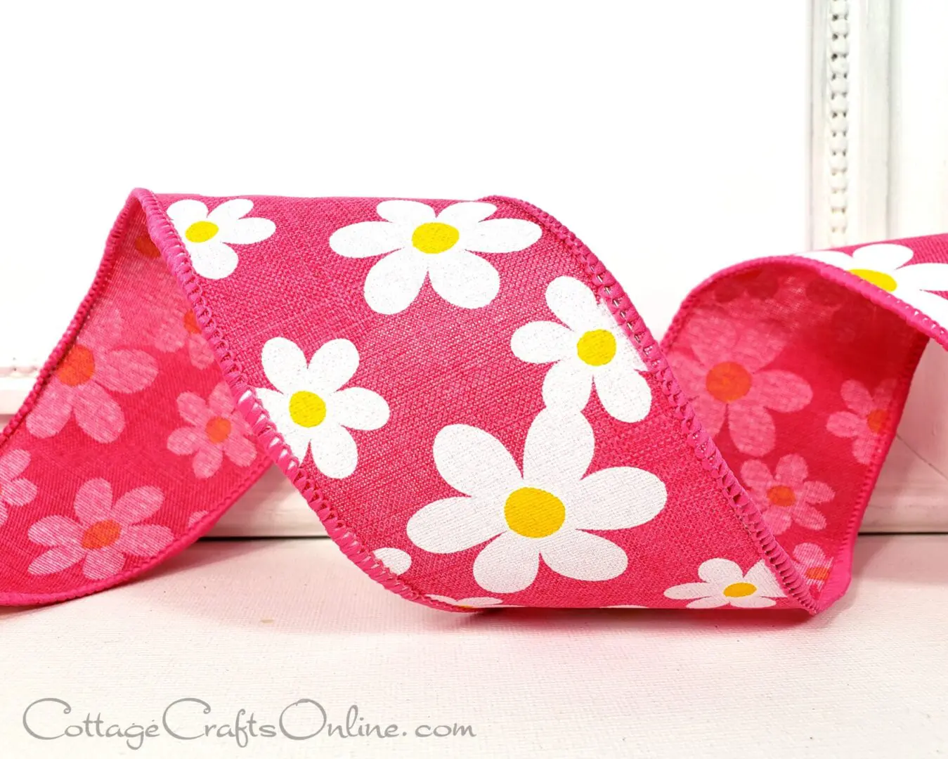 Pop daisies on hot pink 2.5" wide wired ribbon from the Etsy shop of Cottage Crafts Online.
