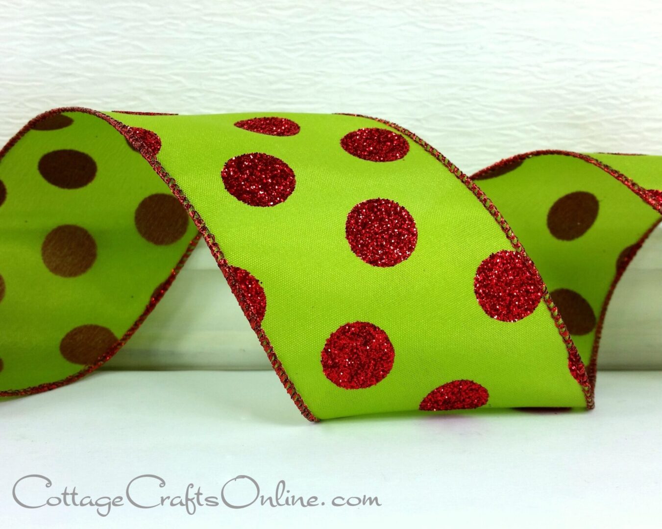 Red glitter dots on lime green satin 2.5" wide wired ribbon from the Etsy shop of Cottage Crafts Online.