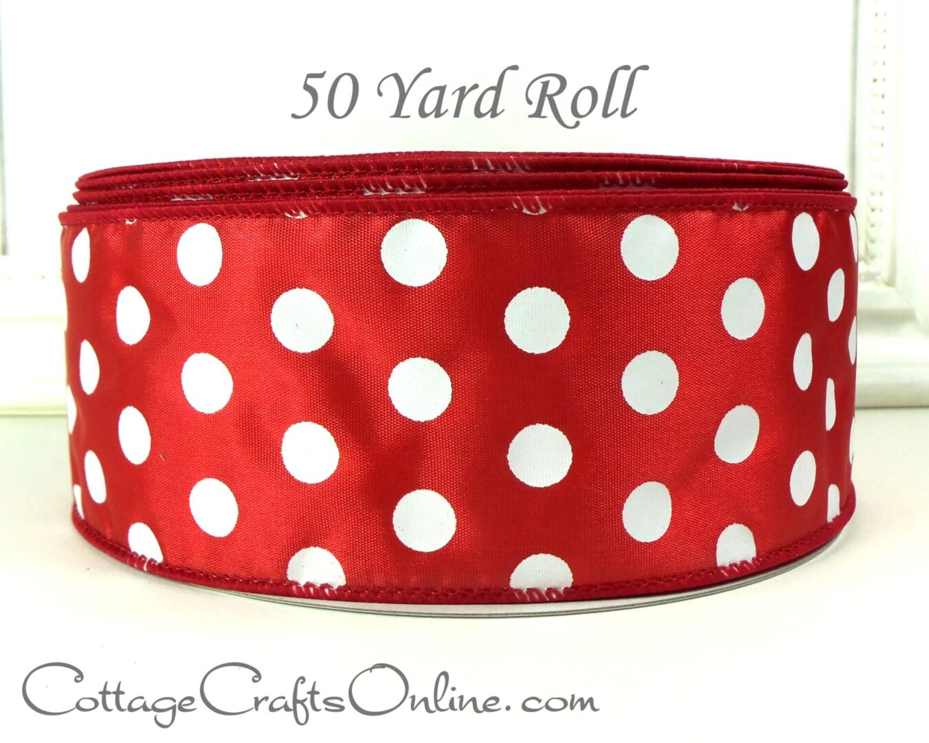White dots on red satin 2.5" wide wired ribbon from the Etsy shop of Cottage Crafts Online.