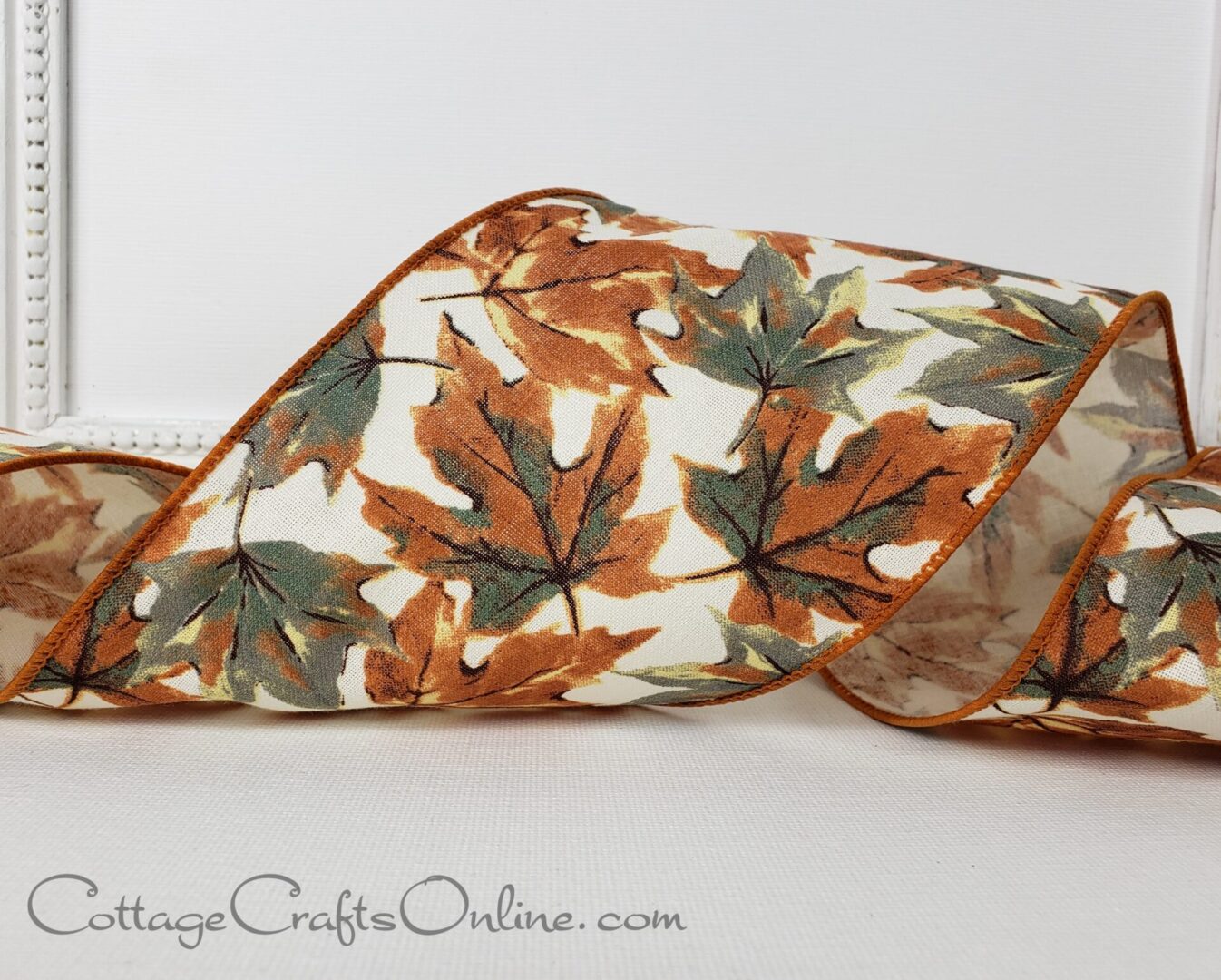 Rust orange grey green autumn leaves on cream 2.5" wide wired ribbon from the Etsy shop of Cottage Crafts Online.