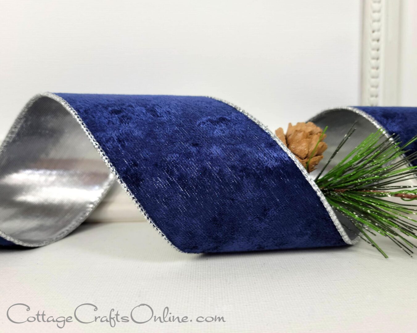 Brushed navy blue velvet with silver back 2.5" wide wired ribbon from the Etsy shop of Cottage Crafts Online.