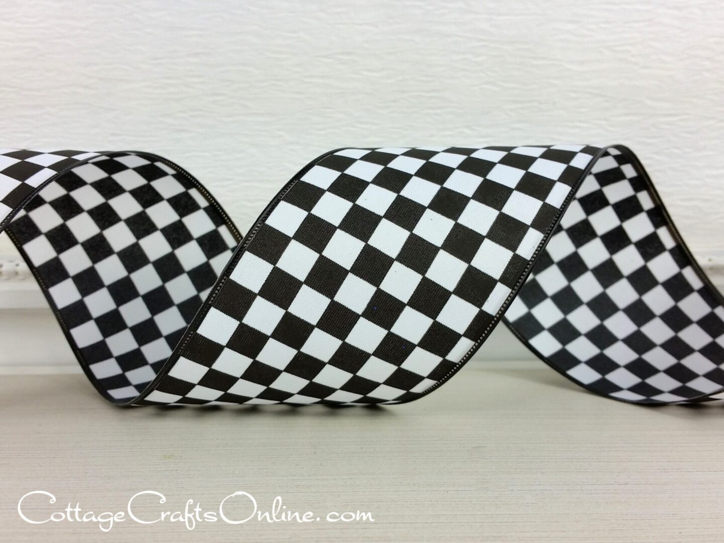 Raceway black and white check 2.5" wide wired ribbon from the Etsy shop of Cottage Crafts Online.