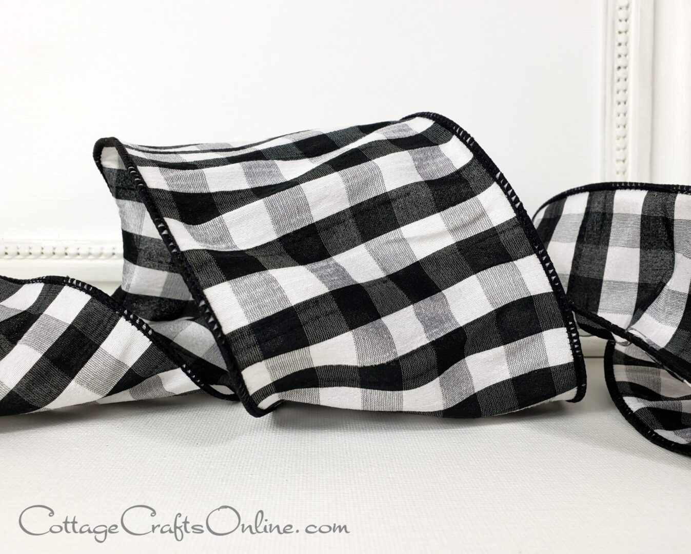 Black, white, light grey check on 4" wide wired ribbon from the Etsy shop of Cottage Crafts Online.
