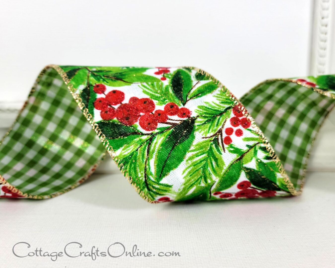 Green holiday foliage and red berries with green and white plaid back 2.5" wide wired ribbon from the Etsy shop of Cottage Crafts Online.