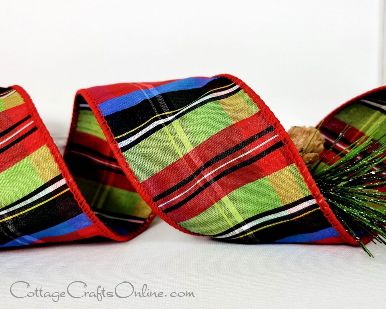 Green, red, blue, black and white tartan 2.5" wide wired ribbon from the Etsy shop of Cottage Crafts Online.