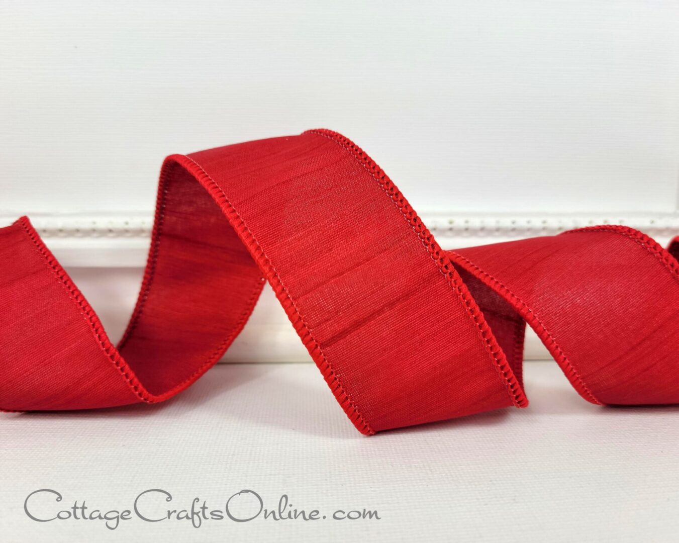 Red faux silk 1.5" wide wired ribbon from the Etsy shop of Cottage Crafts Online.