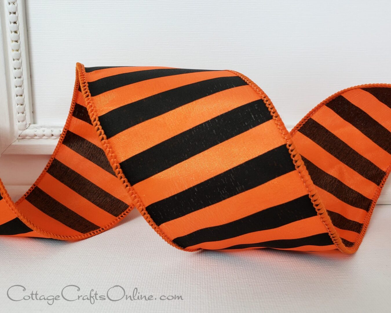 black and orange striped ribbon.