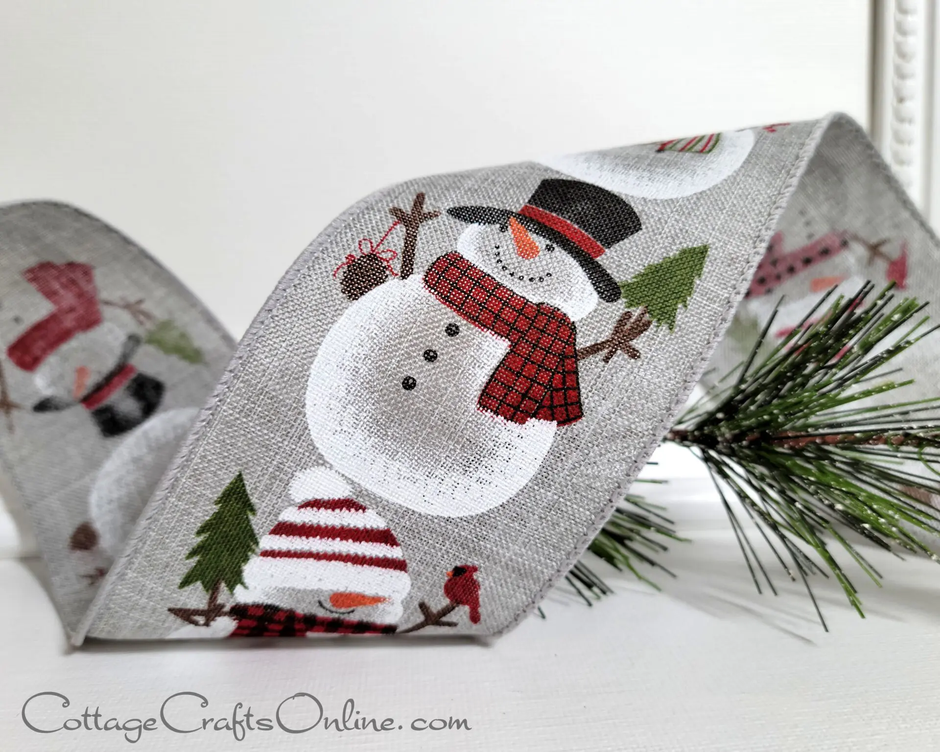 a festive holiday ribbon with snowmen motif.