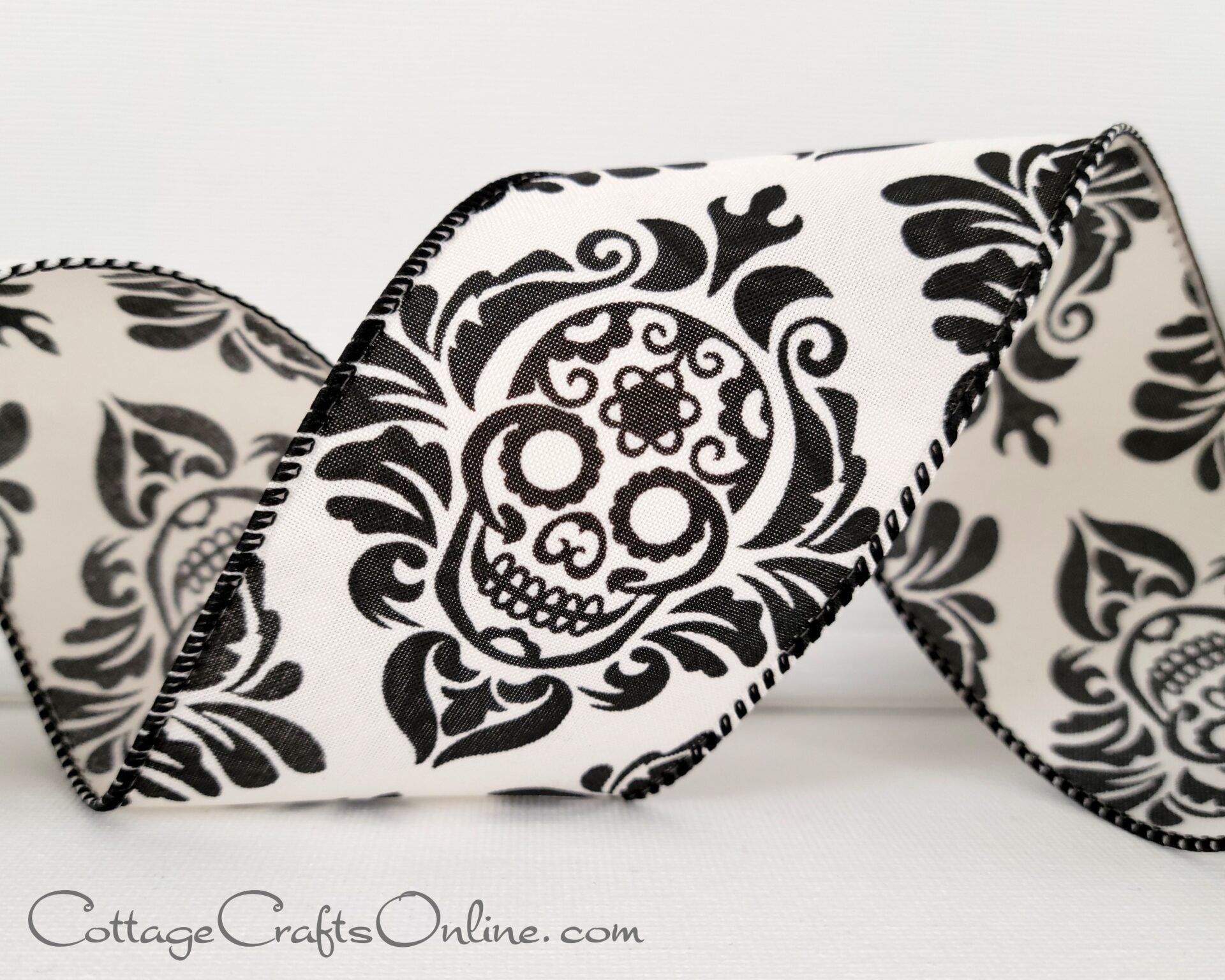 a black and white damask ribbon with a skull on it, perfect for the new fall ribbons collection.