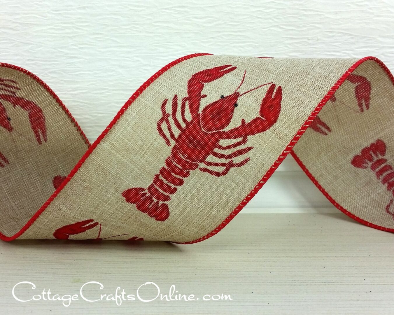 a ribbon with lobsters on it.