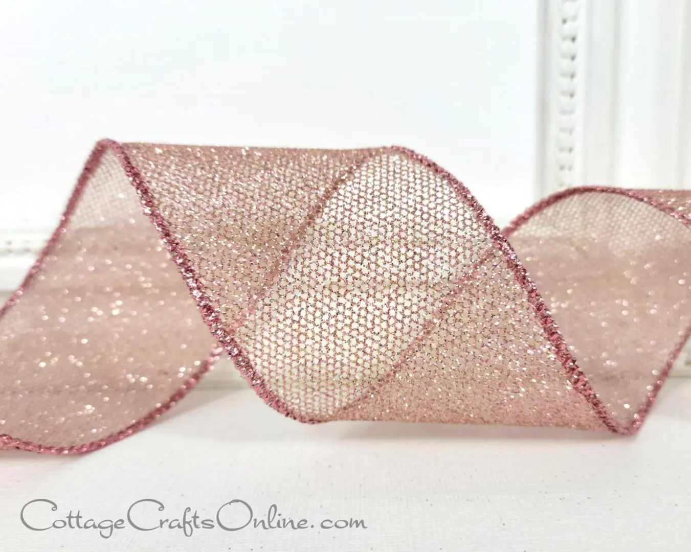 Pink glitter ribbon on top of white frame, available at Cottage Crafts Online.