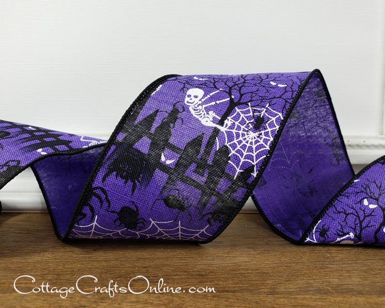 a purple ribbon with a black and white pattern.