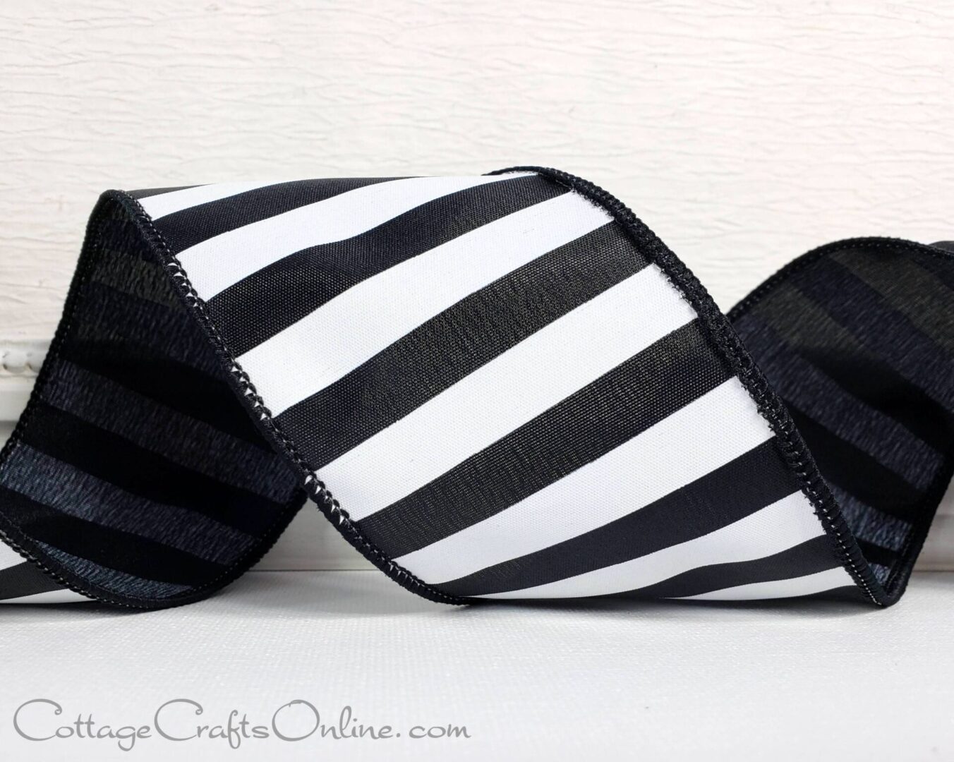 Black white horizontal awning stripes 2.5" wide wired ribbon from the Etsy shop of Cottage Crafts Online.