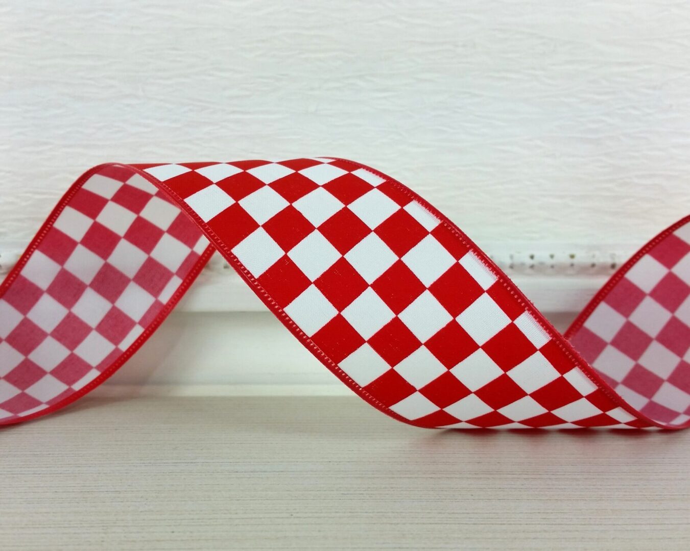 Bold red and white raceway check 1.5" wide wired ribbon from the Etsy shop of Cottage Crafts Online.