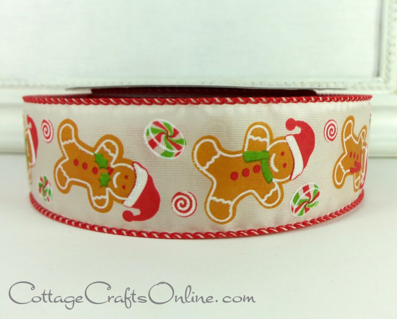 Happy gingerbread cookie people and candy 1.5" wired ribbon from the Etsy shop of Cottage Crafts Online.