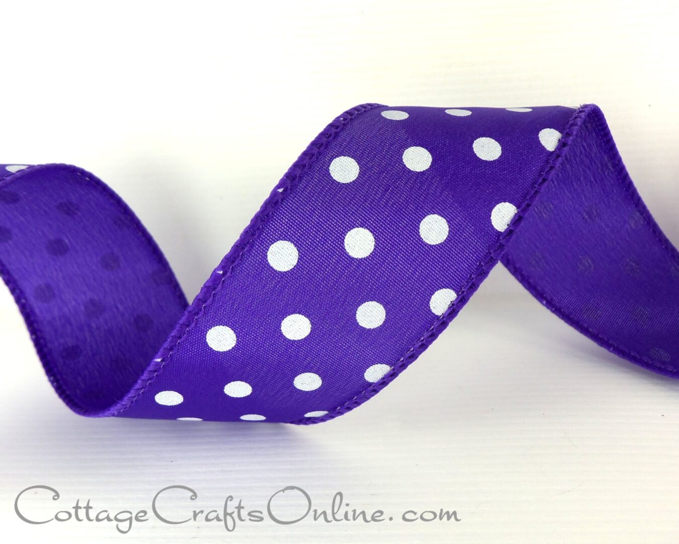 White polka dots on bright purple 2.5" wide wired ribbon from the Etsy shop of Cottage Crafts Online.