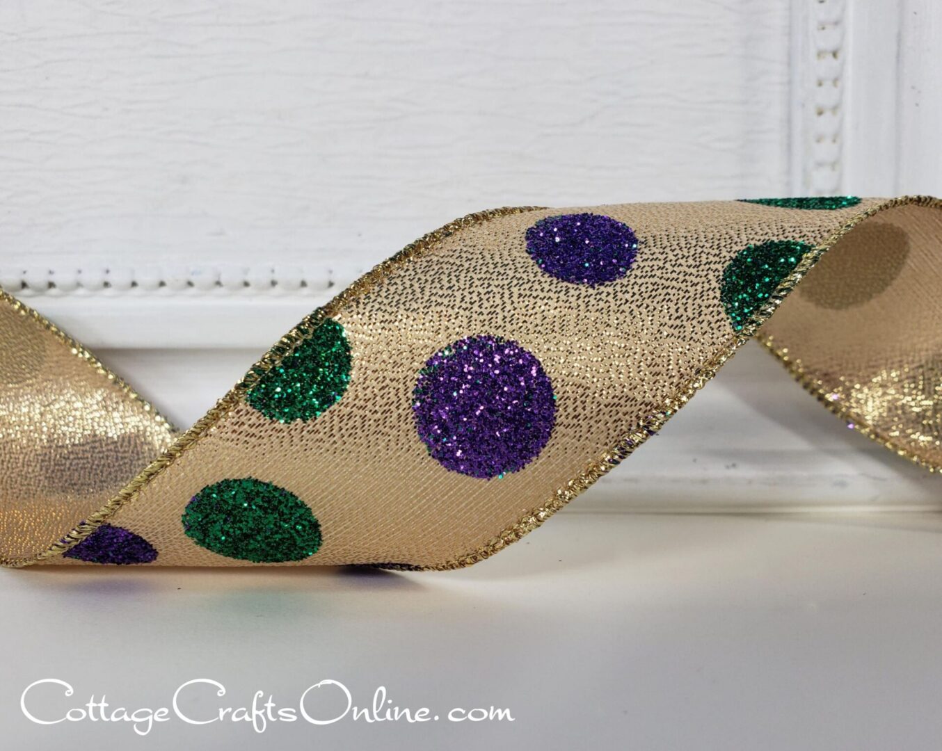 Mardi Gras purple and green glitter dots on gold 1.5" wide wired ribbon from the Etsy shop of Cottage Crafts Online.