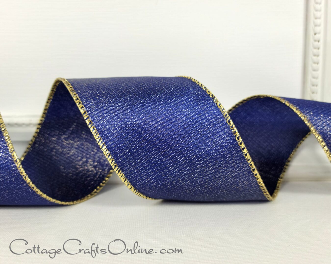 Navy blue with gold edge 2.5" wide wired ribbon from the Etsy shop of Cottage Crafts Online.