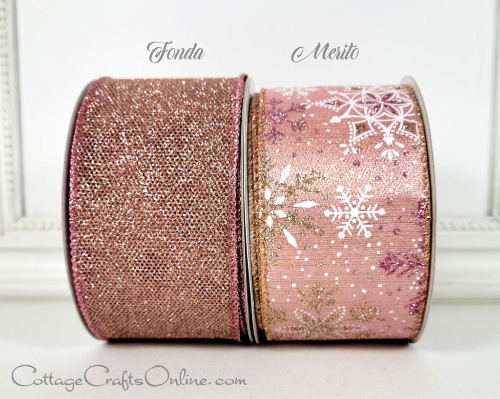 A pink ribbon with snowflakes and sparkles on it