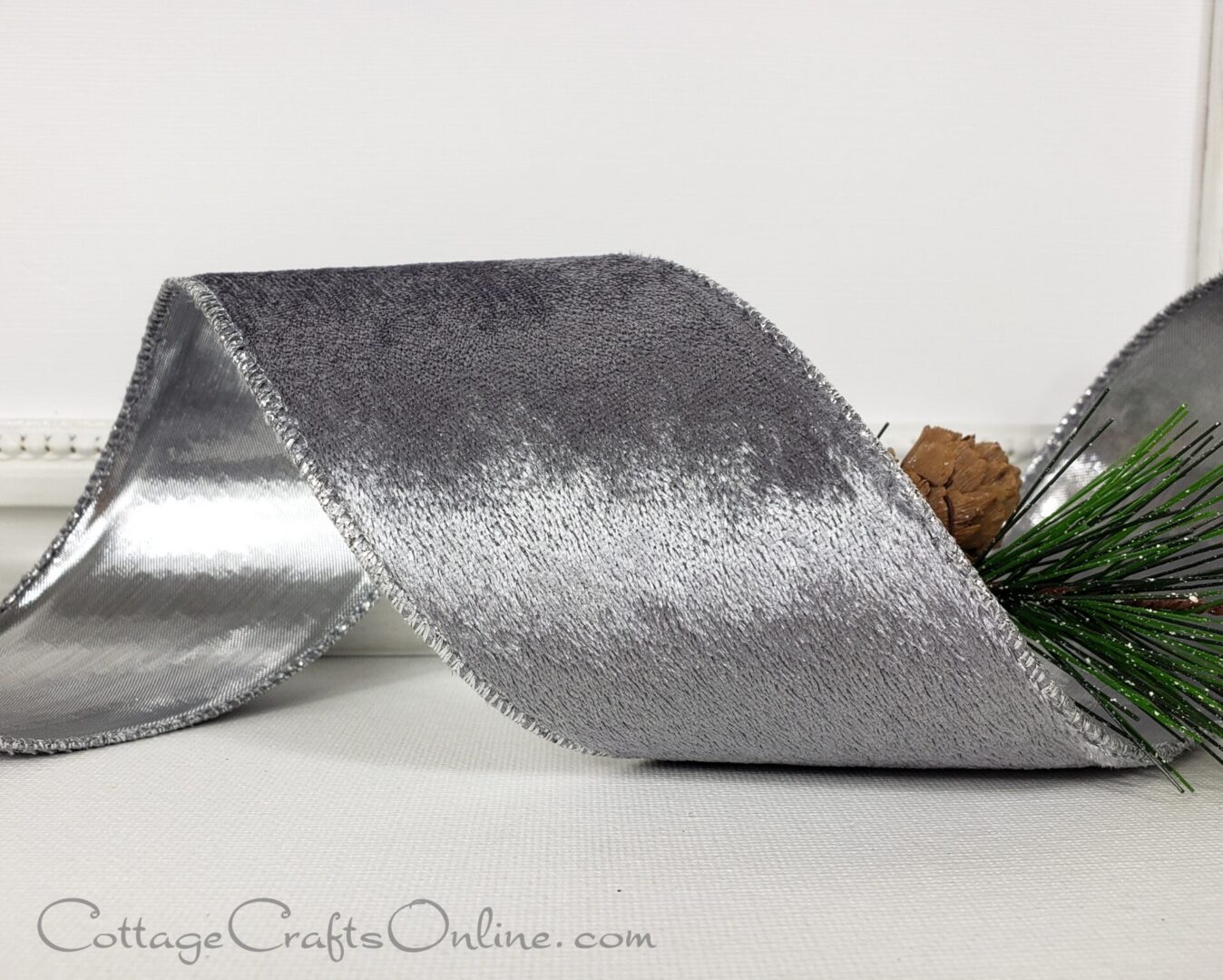 Silver grey velvet with silver metallic lame back 2.5" wide wired ribbon from the Etsy shop of Cottage Crafts Online.