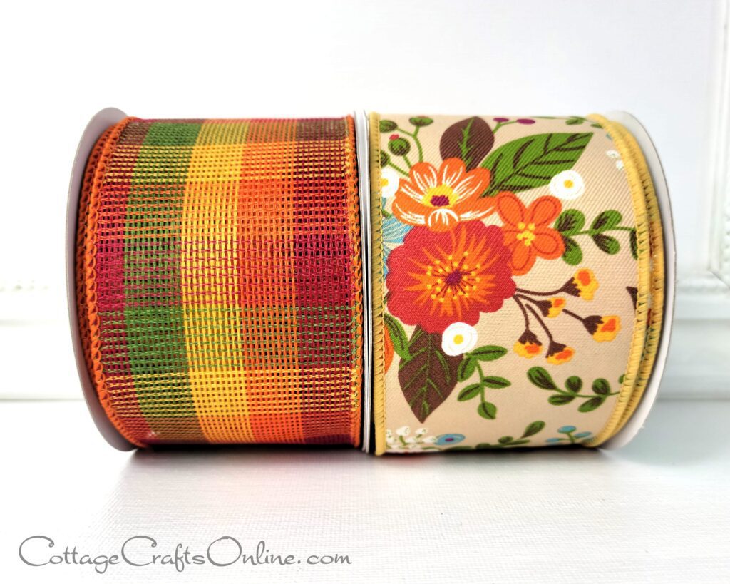 Two rolls of ribbon with a plaid and floral design.