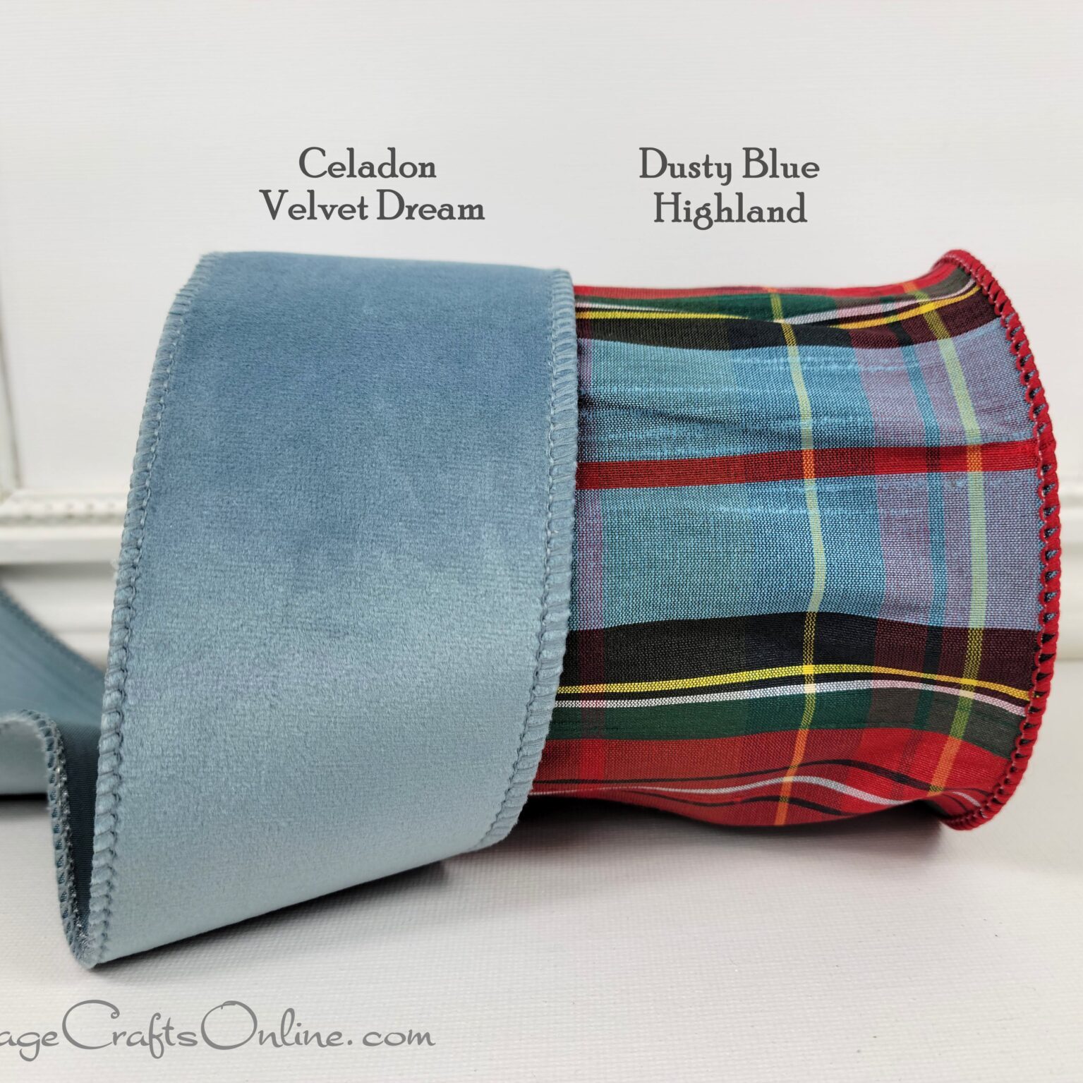 Celadon Blue Velvet Dream ribbon next to Dusty Blue Highland Plaid 4 inch wide wired faux dupioni ribbon by d stevens Fine Ribbons and sold by Cottage Crafts Online. The plaid is blue and red with green, black, yellow and white and a wired edge covered in red thread.