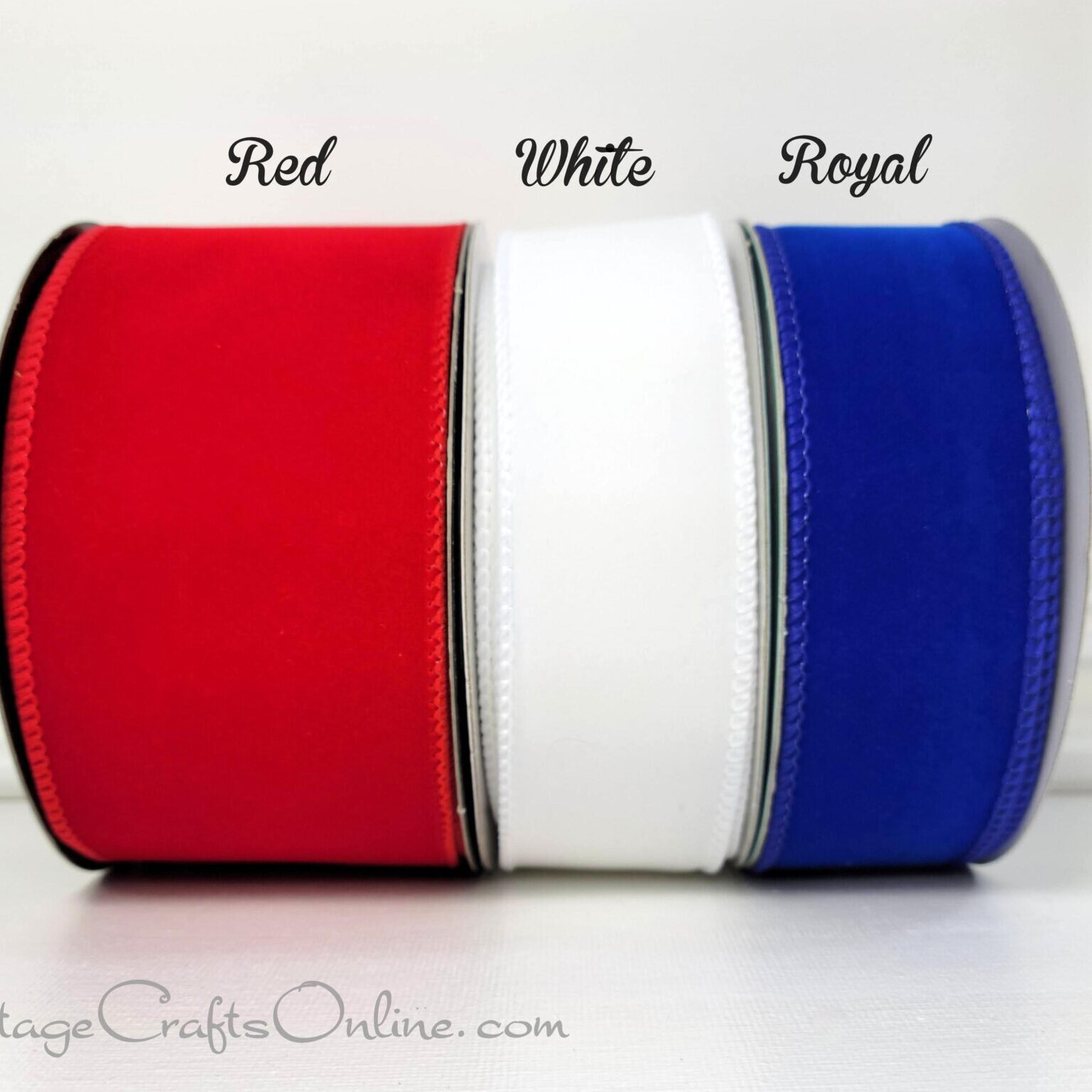 A red white and blue ribbon sitting on top of a table.