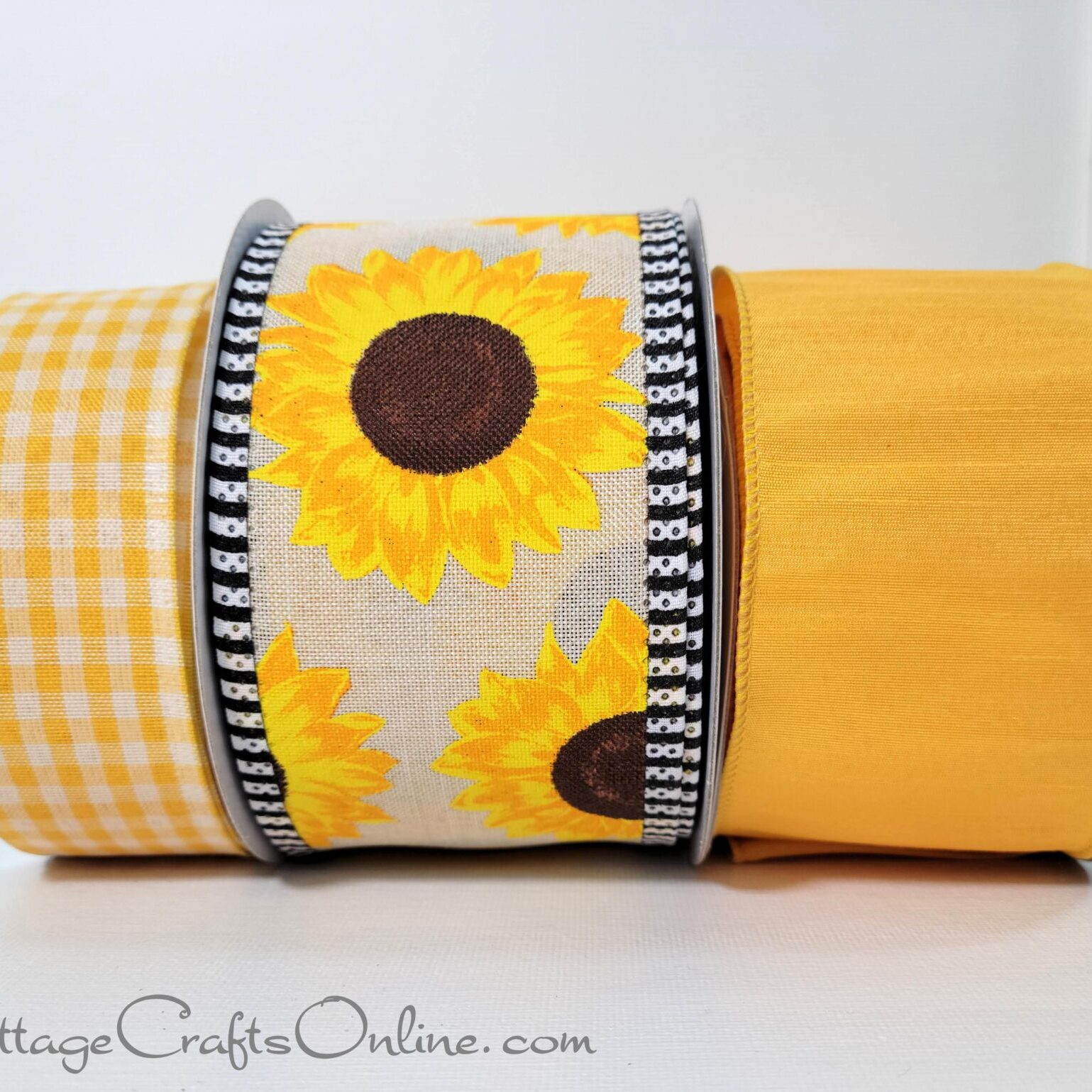 A yellow towel with sunflowers on it